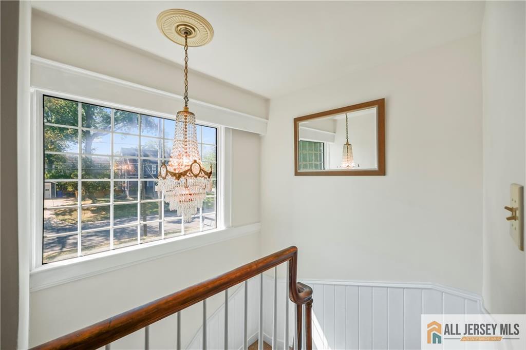 205 Ashland Road Middlesex, NJ 08846 - Photo 14 of 50 a view of a living room with a window and chandelier
