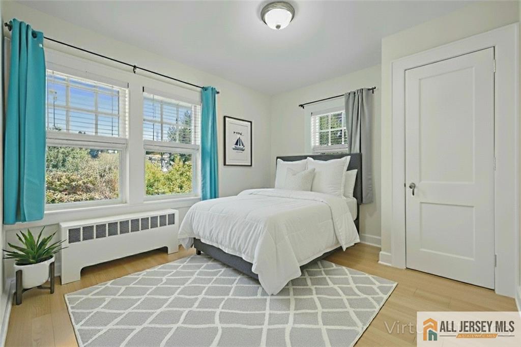 205 Ashland Road Middlesex, NJ 08846 - Photo 19 of 50 a bedroom with a bed and a window