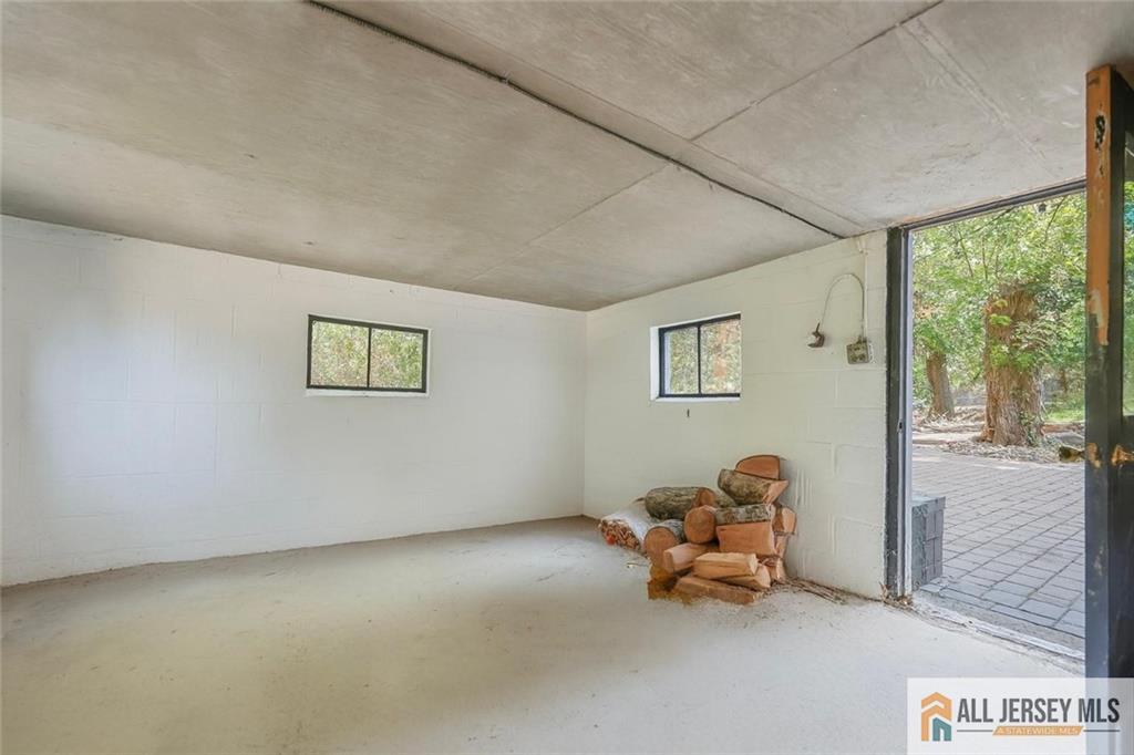 205 Ashland Road Middlesex, NJ 08846 - Photo 29 of 50 a living room with furniture and a large window