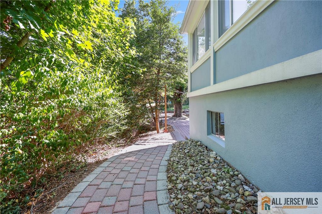 205 Ashland Road Middlesex, NJ 08846 - Photo 33 of 50 a backyard of a house with lots of green space