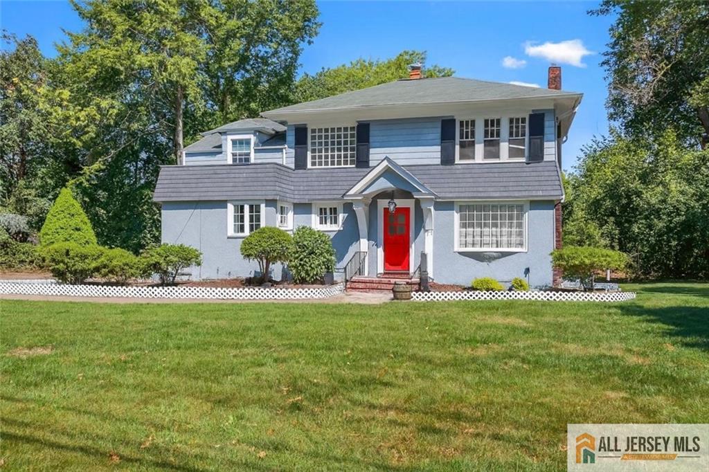 205 Ashland Road Middlesex, NJ 08846 - Photo 50 of 50 a front view of a house with a yard and garage