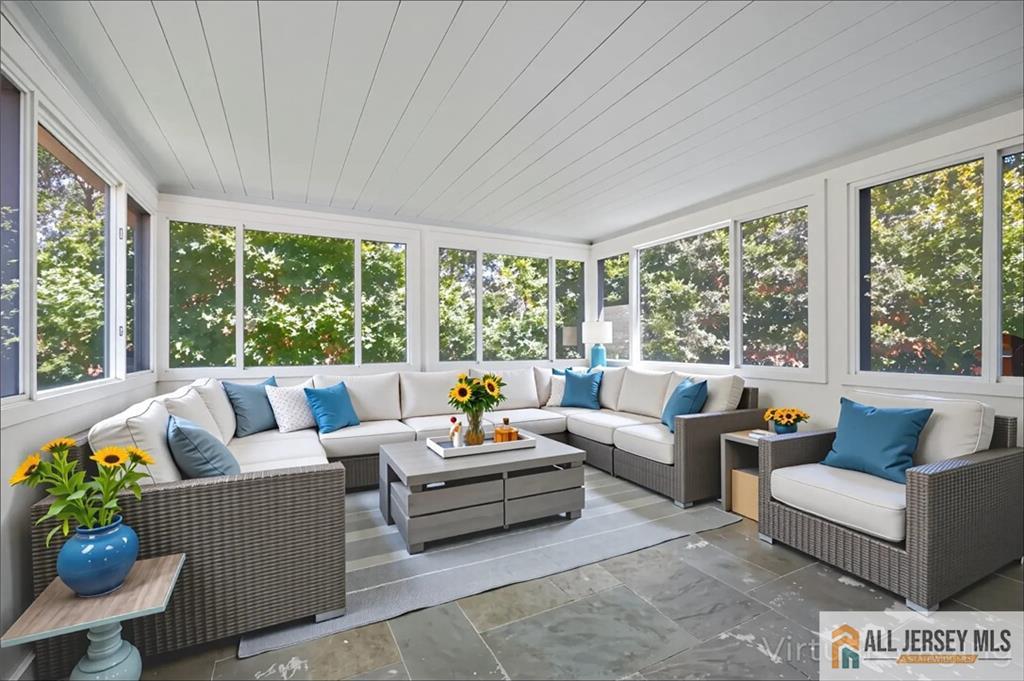 205 Ashland Road Middlesex, NJ 08846 - Photo 10 of 50 a living room with furniture and a large window