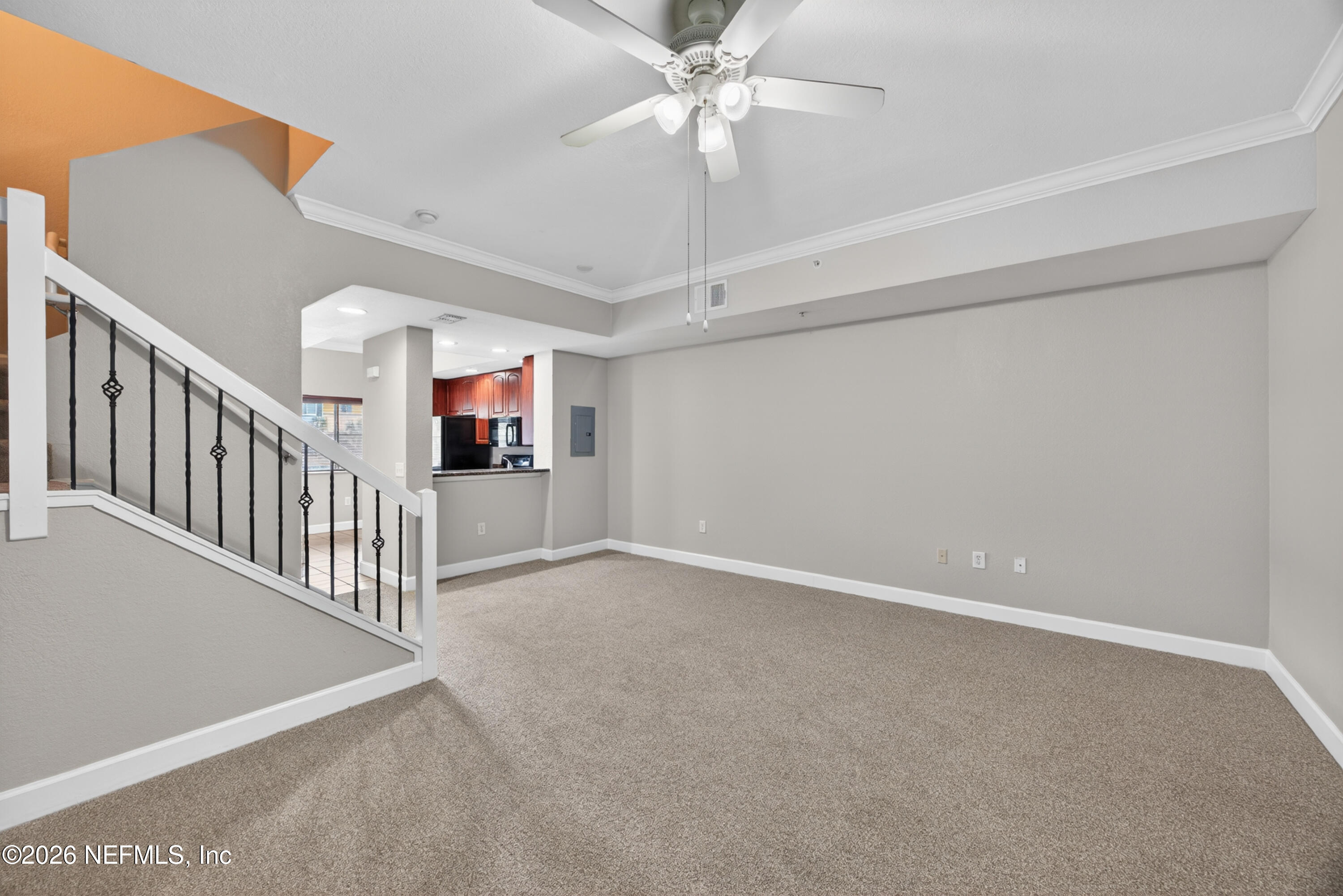 9745 Touchton Road, Unit 1224 Jacksonville, FL 32246 - Photo 9 of 22 en view interior of a house with stairs and a ceiling fan