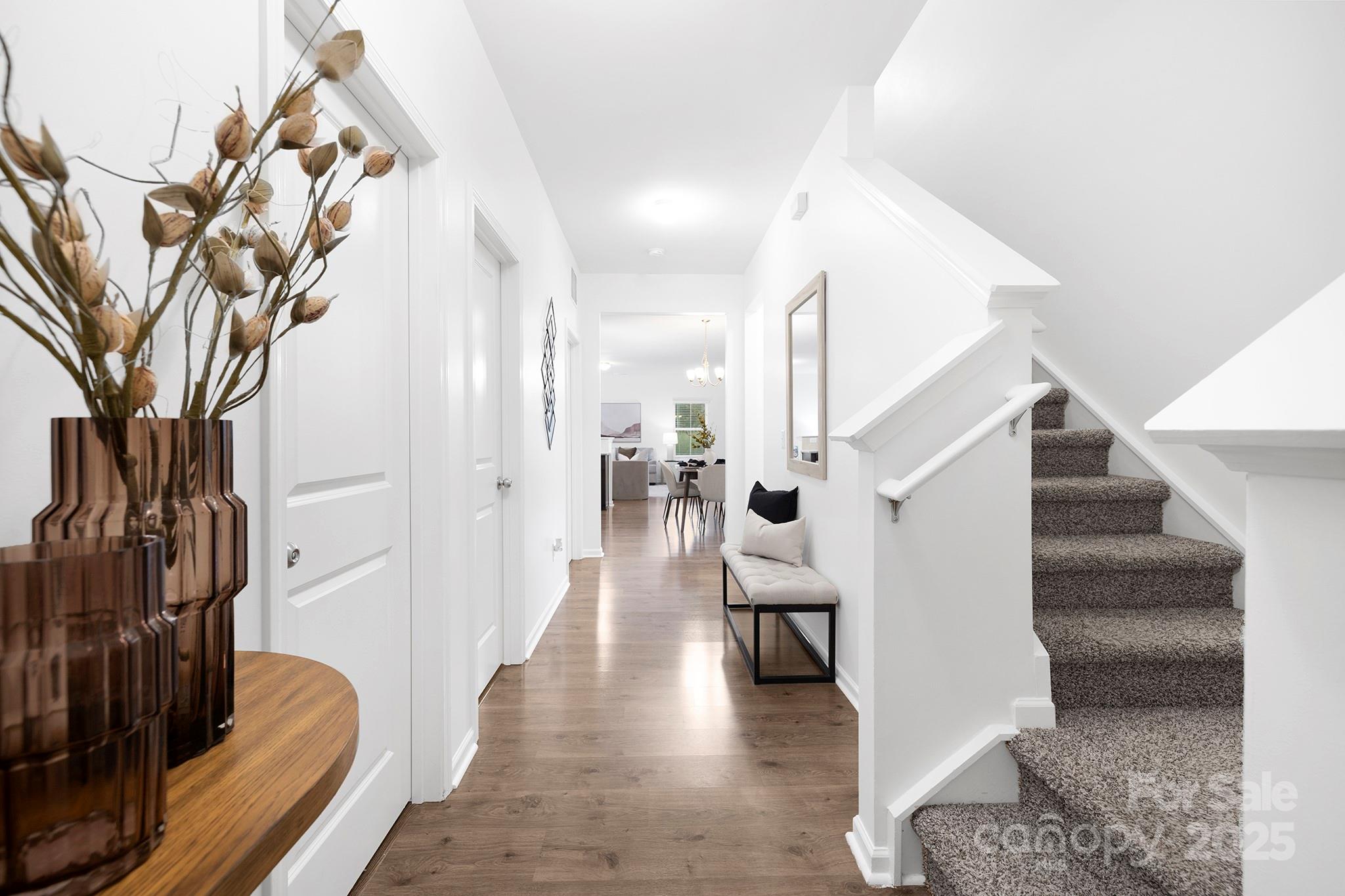 12970 Hill Pine Road, Unit 248 Midland, NC 28107 - Photo 16 of 30 a view of entryway and hall with wooden floor
