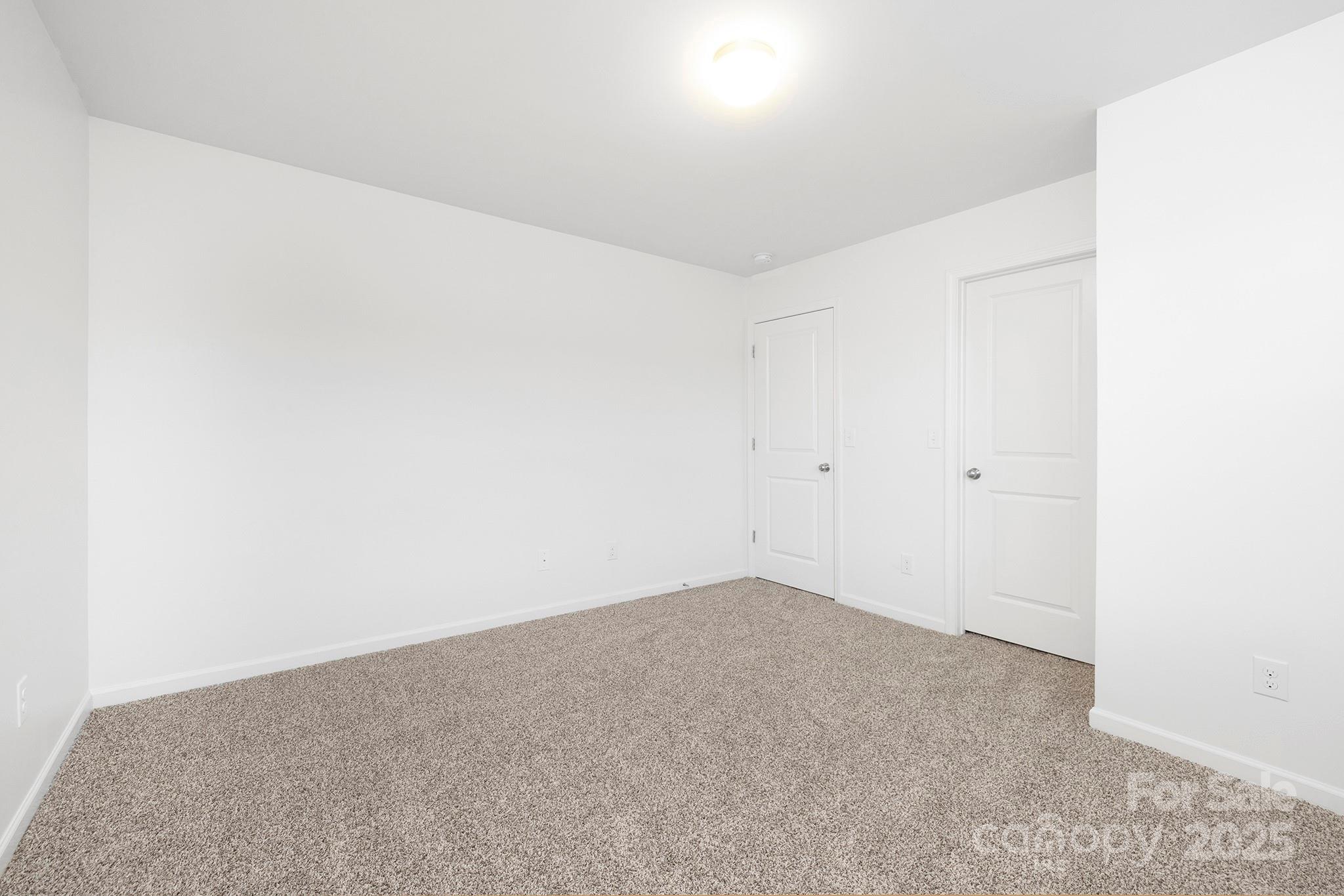 12970 Hill Pine Road, Unit 248 Midland, NC 28107 - Photo 21 of 30 a view of an empty room
