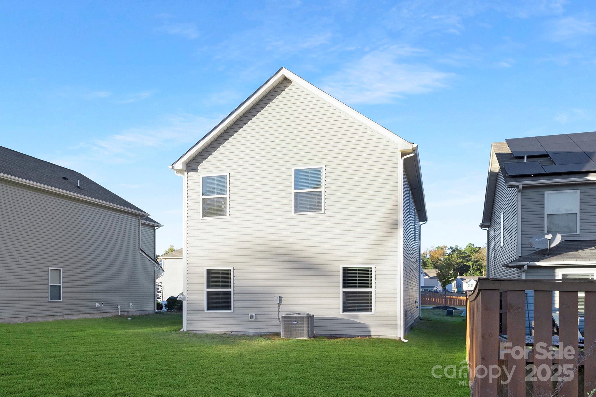12970 Hill Pine Road, Unit 248 Midland, NC 28107 - Photo 27 of 30 a view of a house with backyard