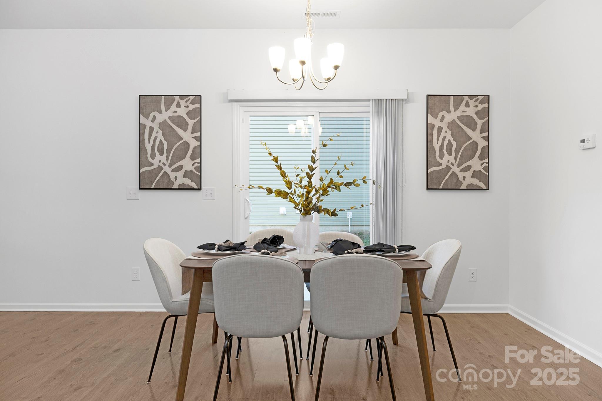 12970 Hill Pine Road, Unit 248 Midland, NC 28107 - Photo 7 of 30 a view of a dining room with furniture window and outside view