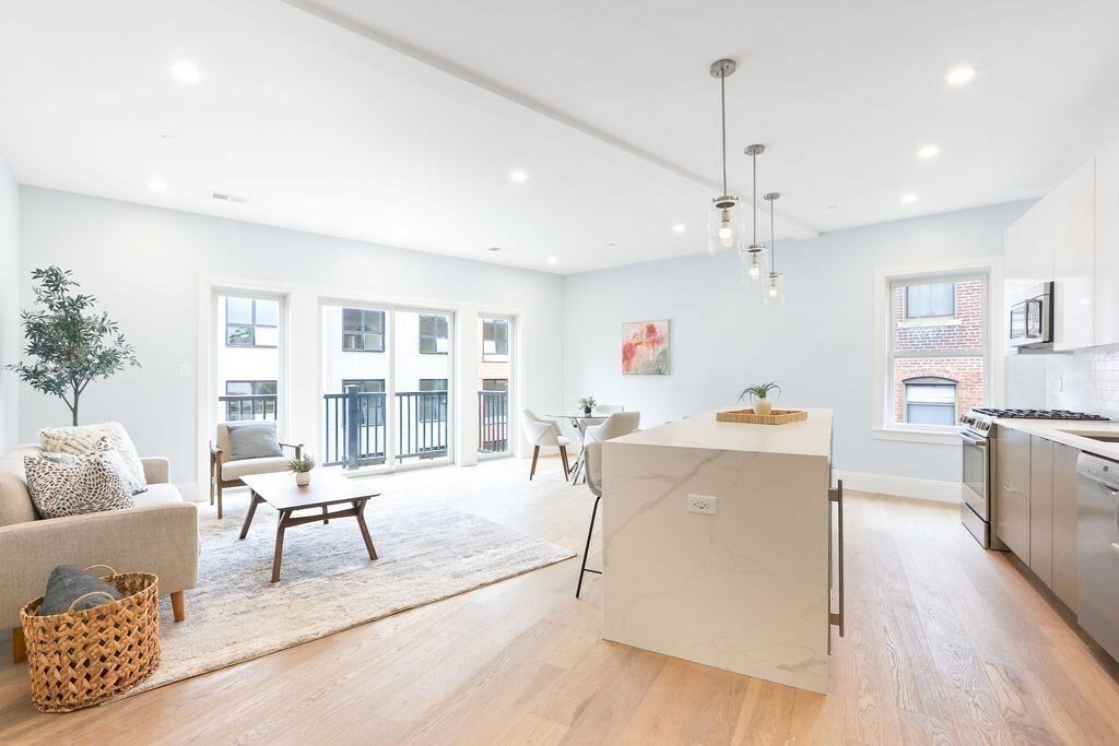21 Glen Road, Unit 2 Boston, MA 02130 - Photo 4 of 13 a living room with furniture and kitchen view