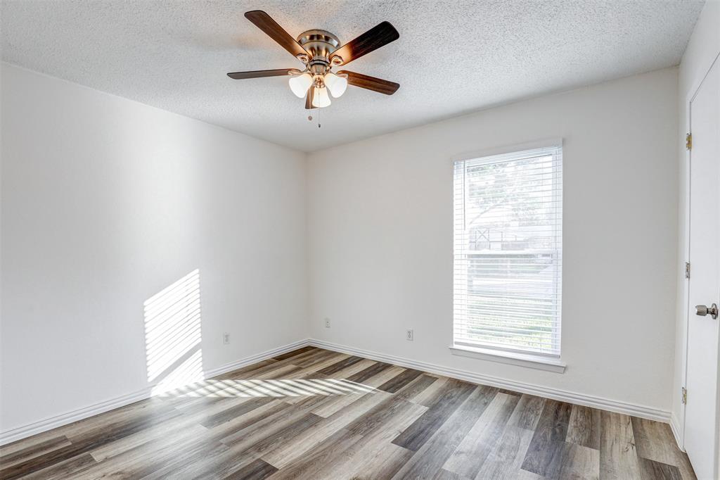 6005 Oak Hill Road Watauga, TX 76148 - Photo 16 of 22 an empty room with a window