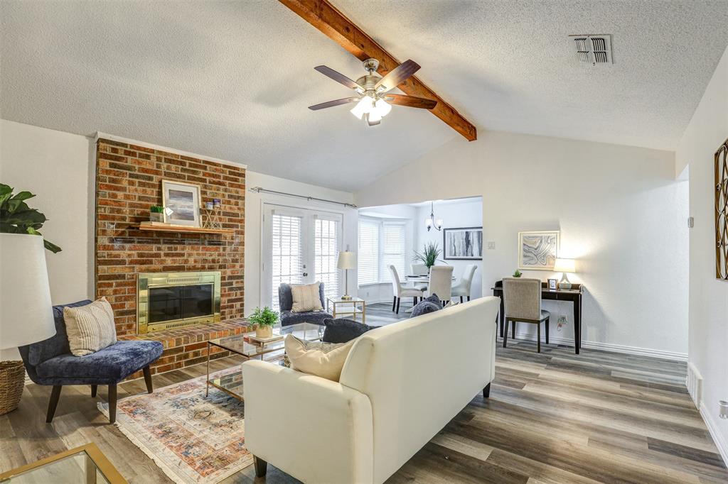 6005 Oak Hill Road Watauga, TX 76148 - Photo 4 of 22 a living room with furniture and fireplace