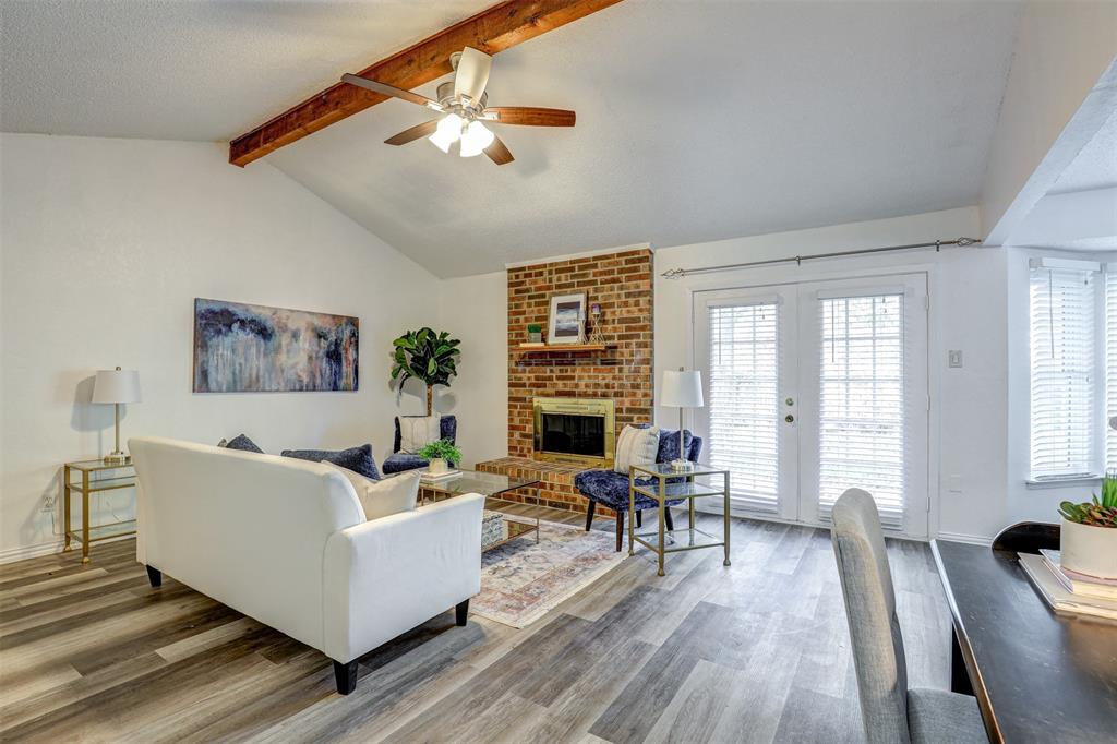 6005 Oak Hill Road Watauga, TX 76148 - Photo 5 of 22 a living room with furniture large window and wooden floor