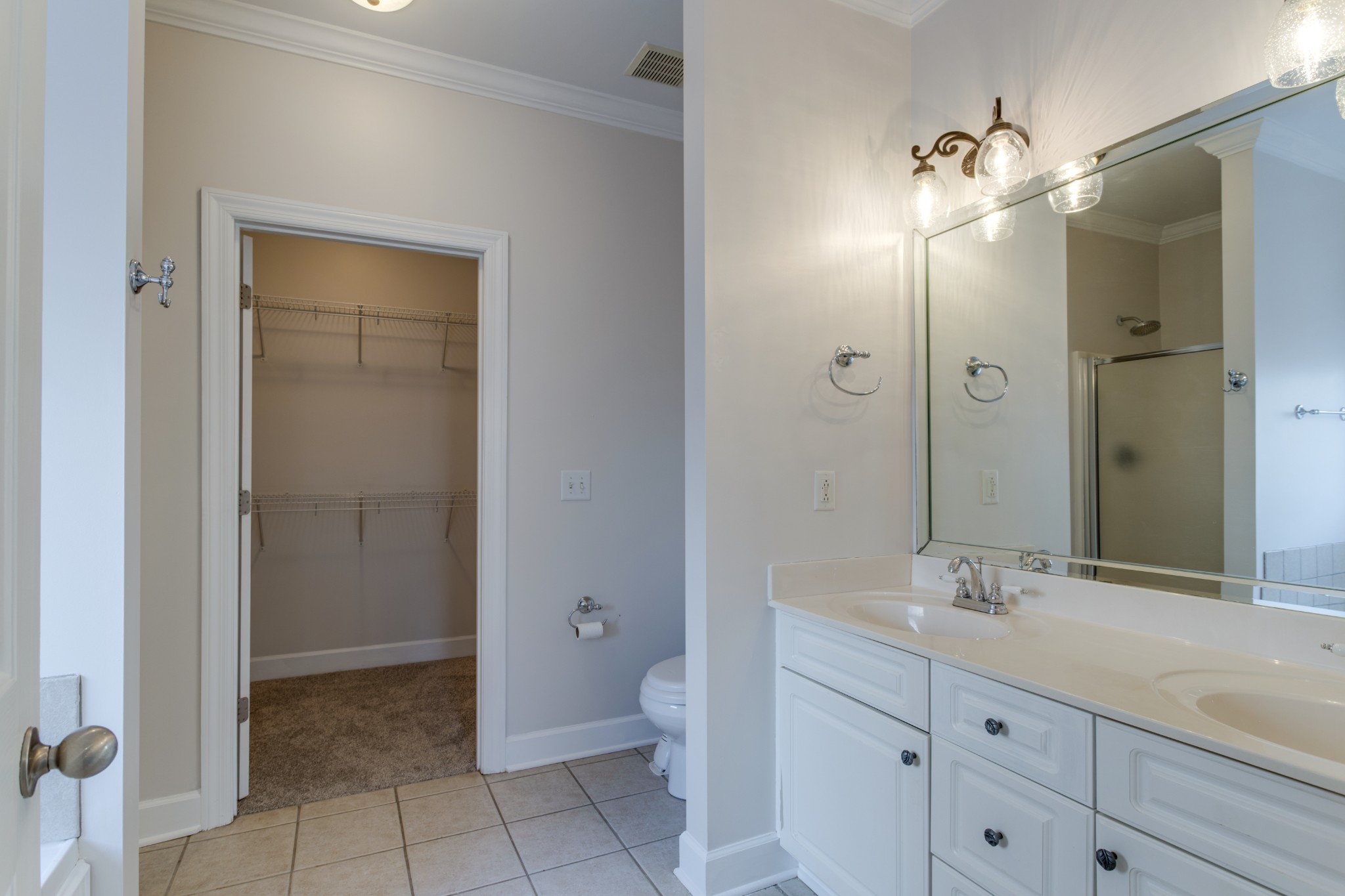 433 Bethany Circle Murfreesboro, TN 37128 - Photo 13 of 23 a spacious bathroom with a granite countertop sink a toilet and a mirror