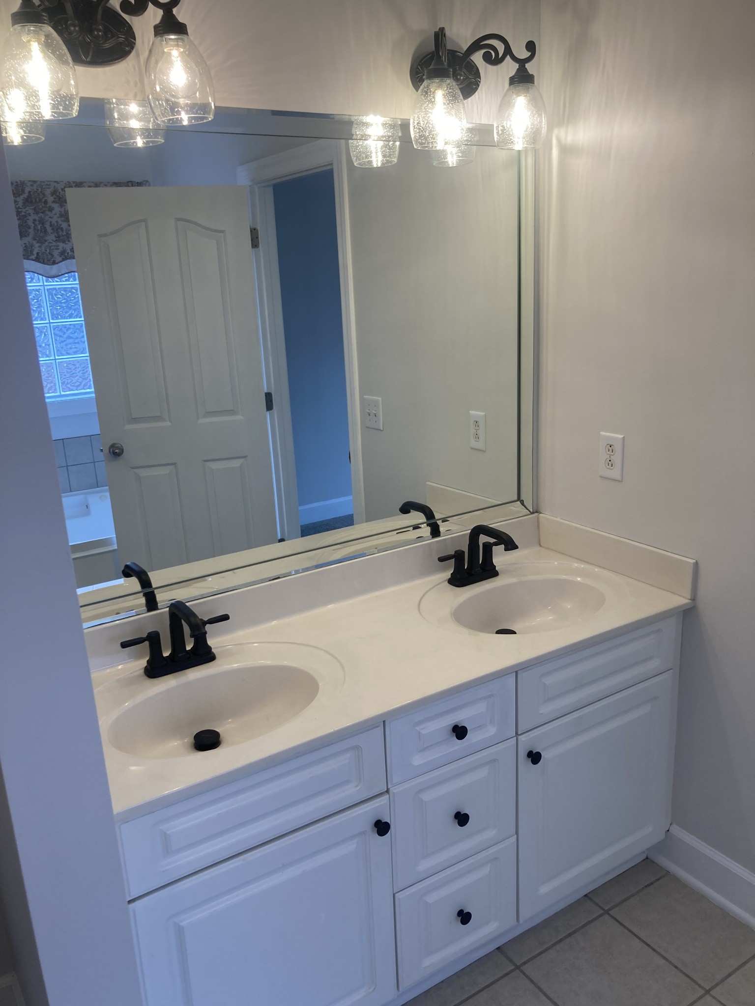 433 Bethany Circle Murfreesboro, TN 37128 - Photo 14 of 23 a bathroom with a sink double vanity and a mirror