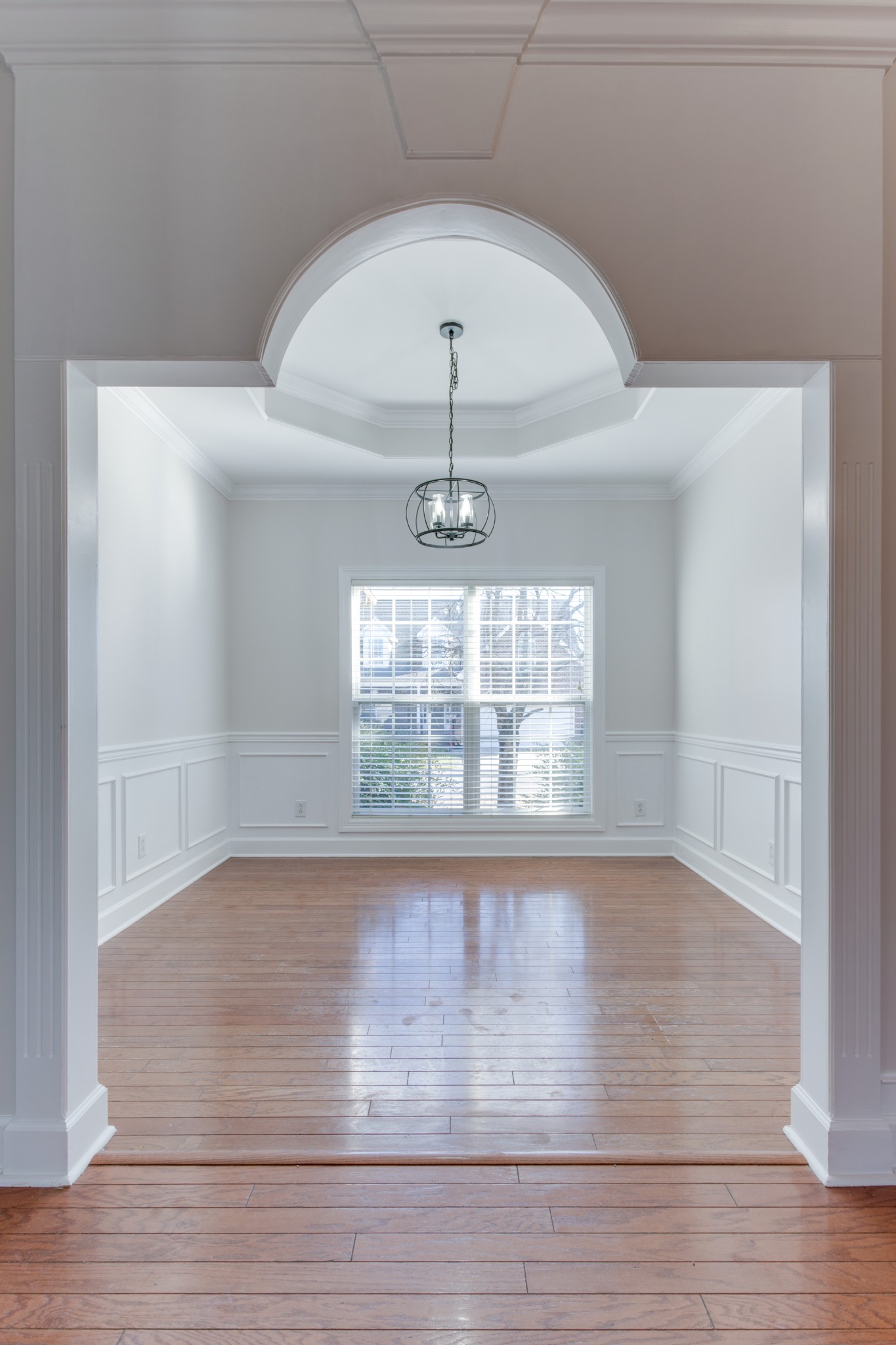 433 Bethany Circle Murfreesboro, TN 37128 - Photo 10 of 23 a view of an empty room with wooden floor and a window