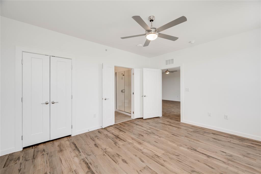 4801 Springdale Road, Unit 1307 Austin, TX 78723 - Photo 10 of 30 wooden floor in an empty room