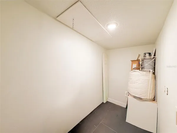 a view of a storage & utility room with utility room