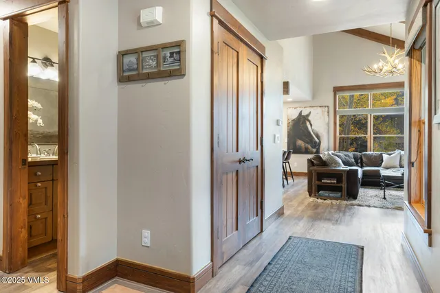 a living room with furniture and a table