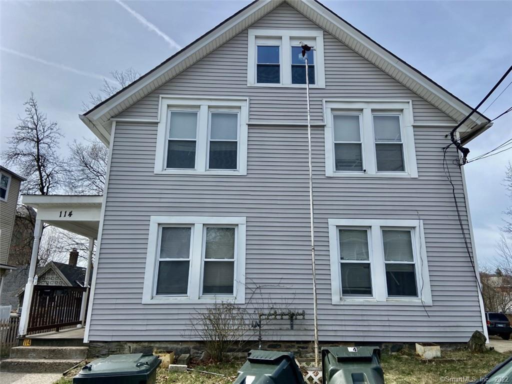 114 Spring Street Windham, CT 06226 - Photo 1 of 1 a view of a house with more windows and brick wall