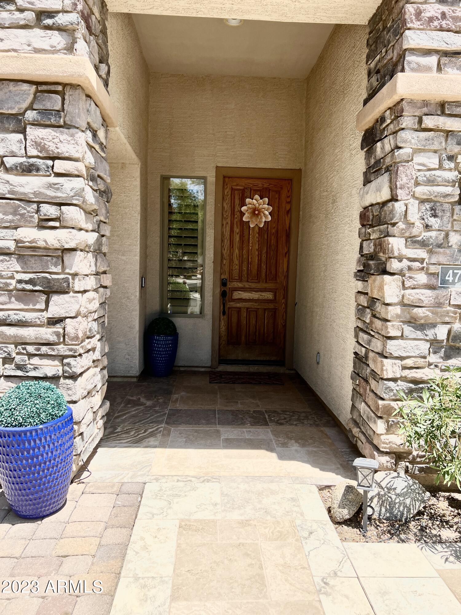 4735 South Rim Road Gilbert, AZ 85297 - Photo 3 of 38 a view of entrance door of the house
