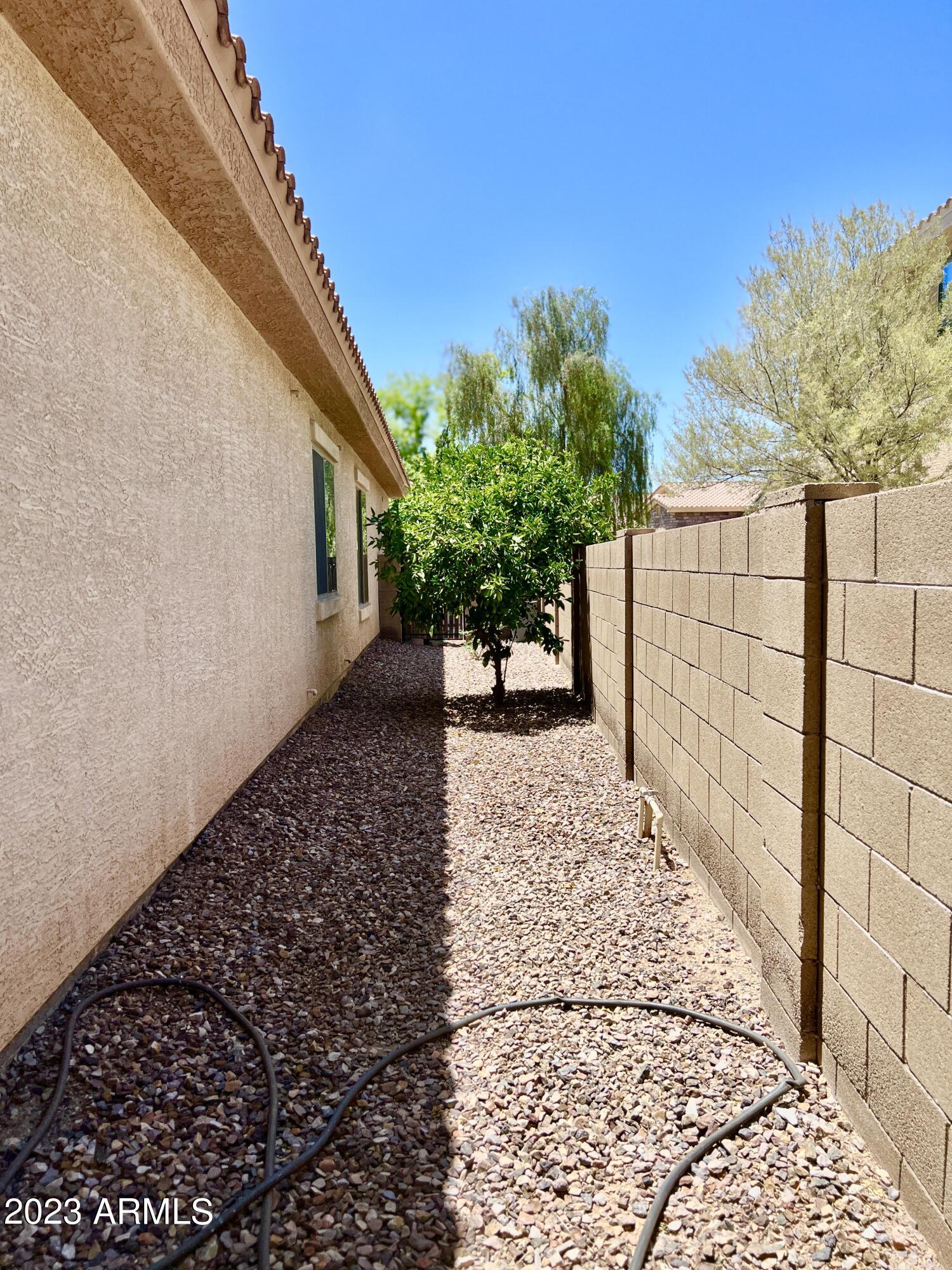 4735 South Rim Road Gilbert, AZ 85297 - Photo 38 of 38 a view of a pathway with a yard