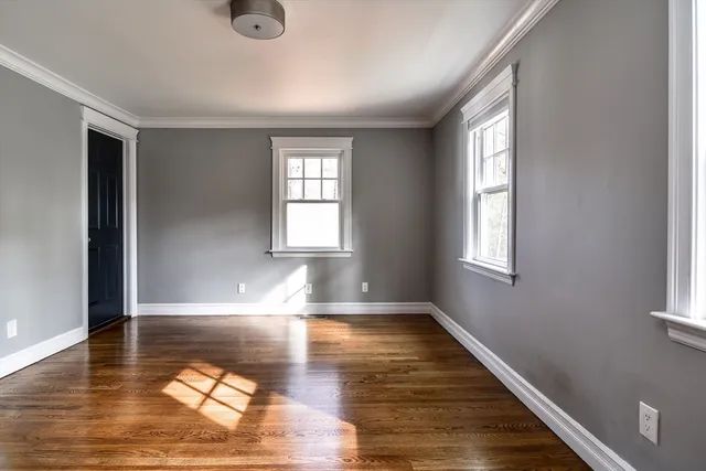 a bathroom with a sink toilet and mirror