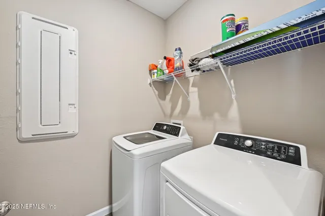 a utility room with dryer and washer