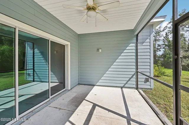 a balcony with view of swimming pool