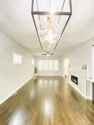 a kitchen with a sink and a stove top oven