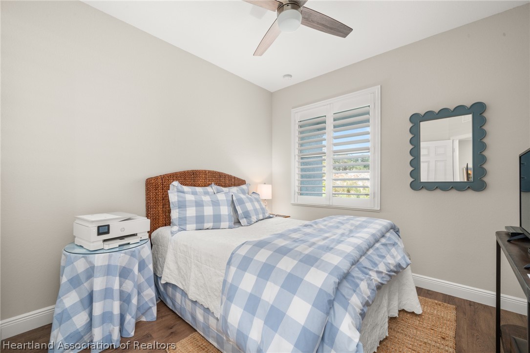 4734 Haw Branch Road, Unit 110 Sebring, FL 33875 - Photo 26 of 50 a bedroom with a bed and a window