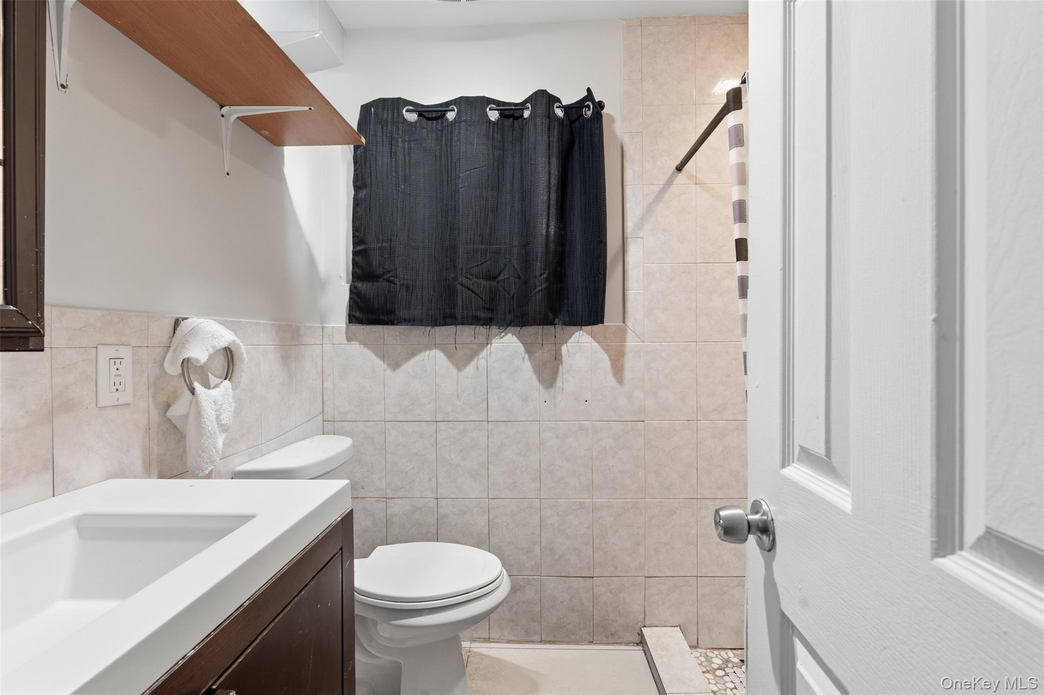 153 South Pascack Road Nanuet, NY 10954 - Photo 11 of 27 a bathroom with a sink and a toilet
