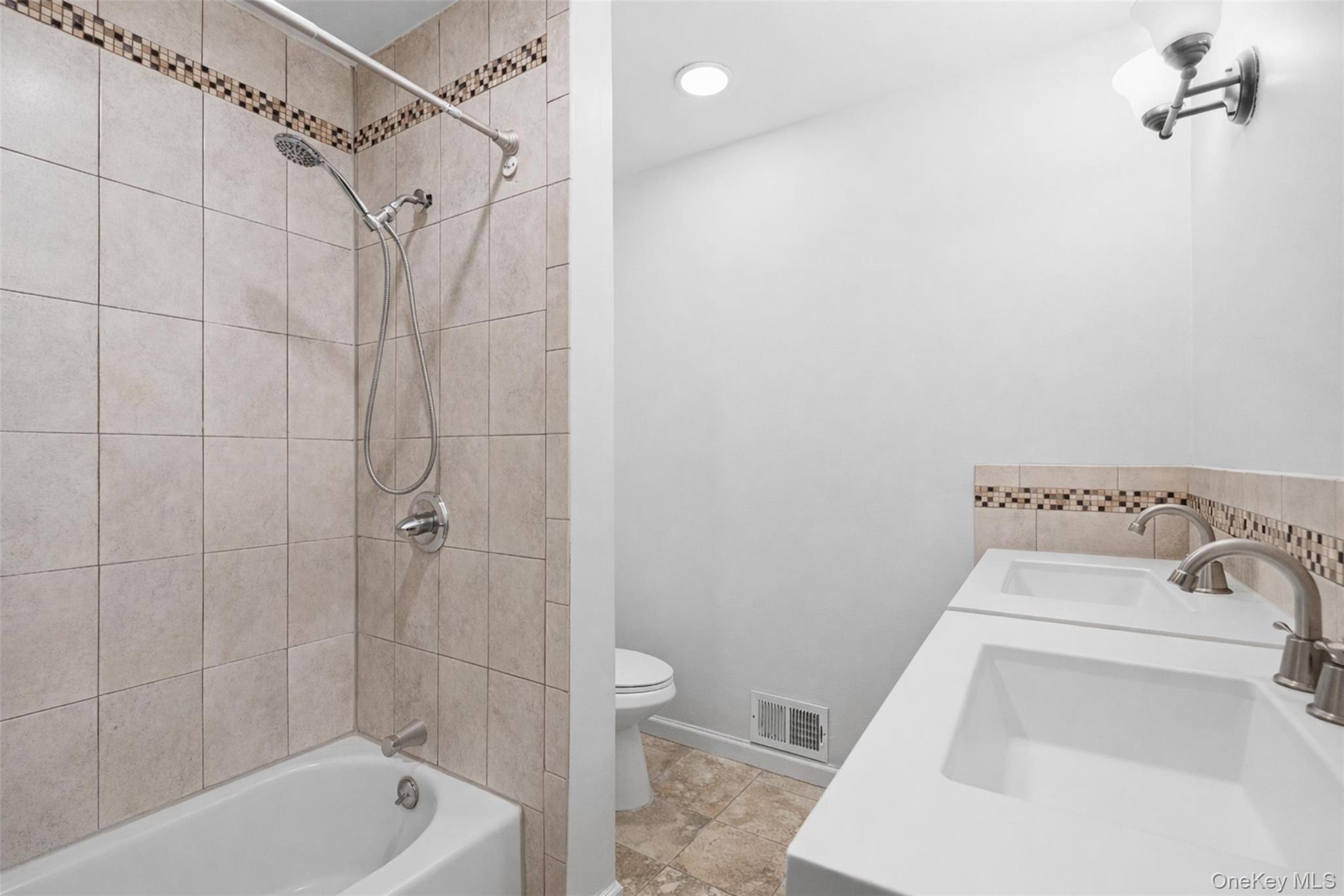 153 South Pascack Road Nanuet, NY 10954 - Photo 12 of 27 a bathroom with a sink a toilet and shower