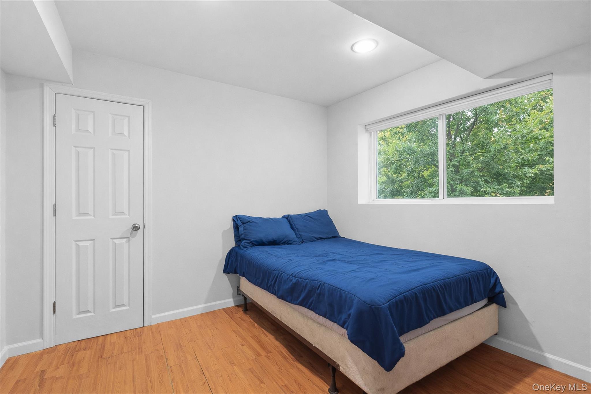 153 South Pascack Road Nanuet, NY 10954 - Photo 13 of 27 a bedroom with a bed and window