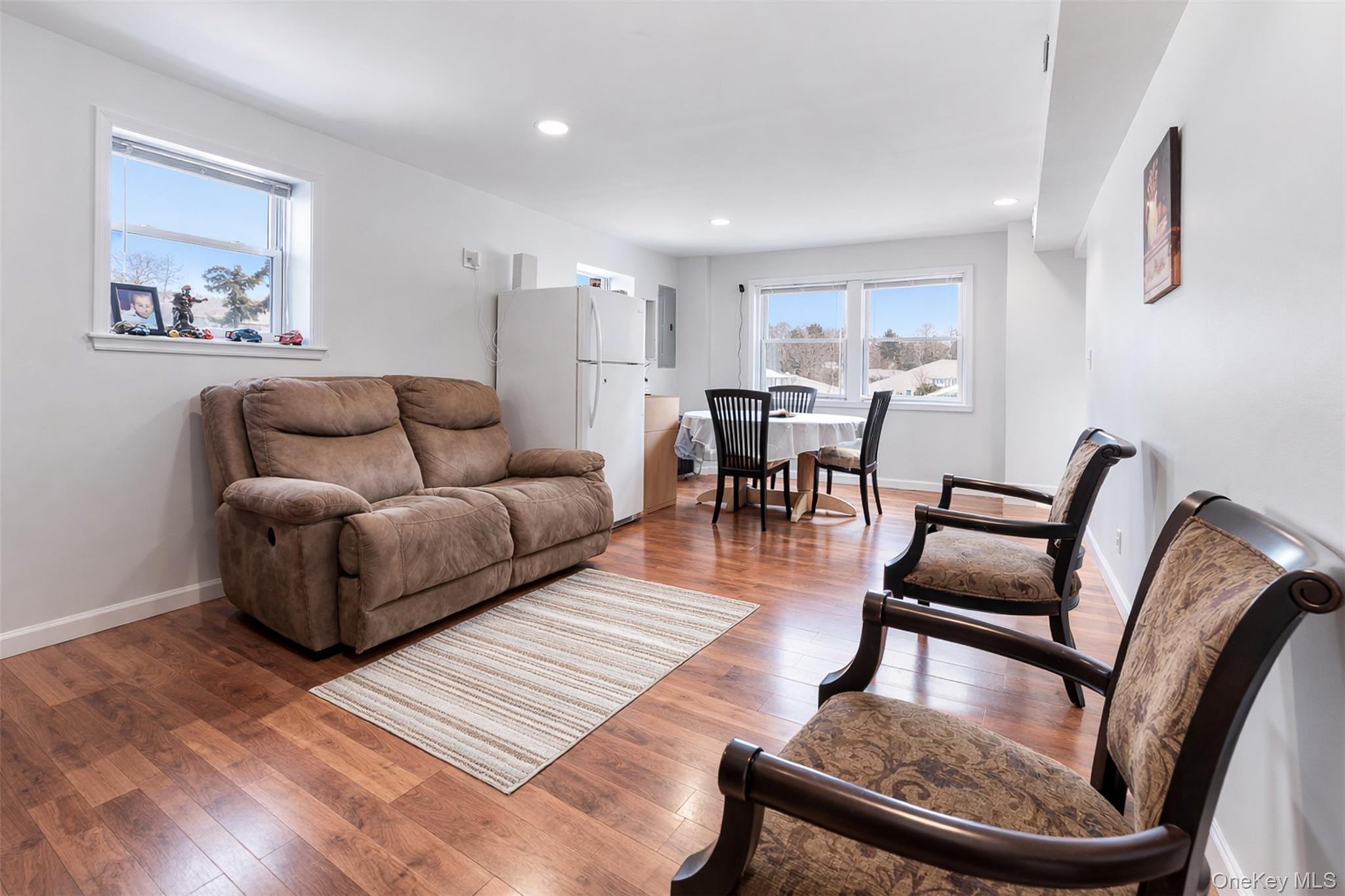 153 South Pascack Road Nanuet, NY 10954 - Photo 16 of 28 a living room with furniture and wooden floor