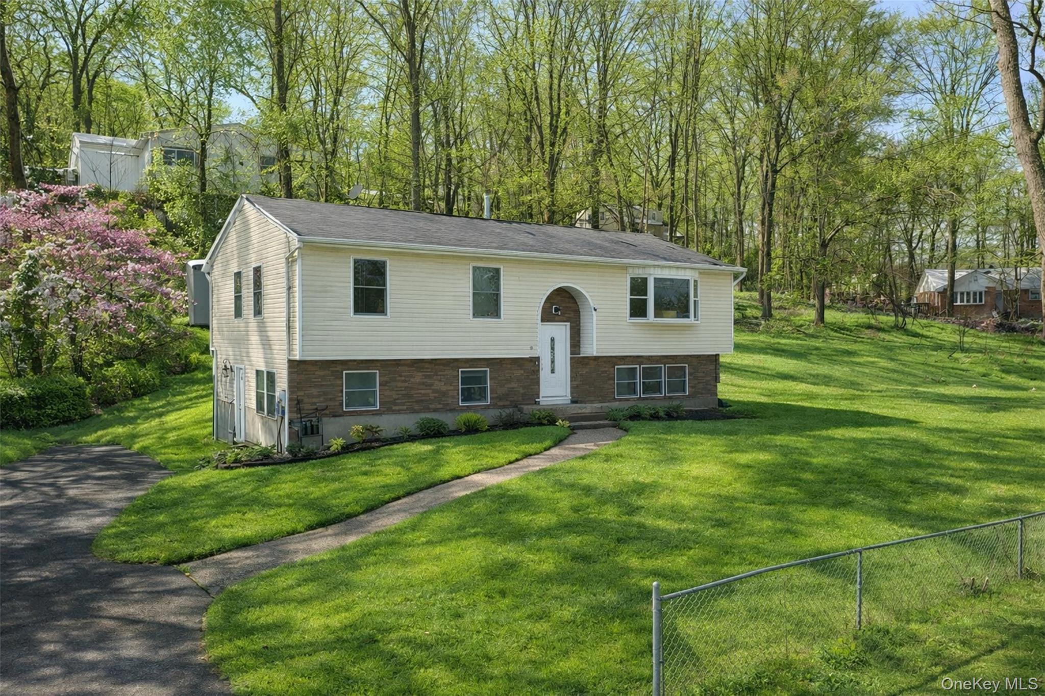 153 South Pascack Road Nanuet, NY 10954 - Photo 25 of 27 a view of a house with a yard
