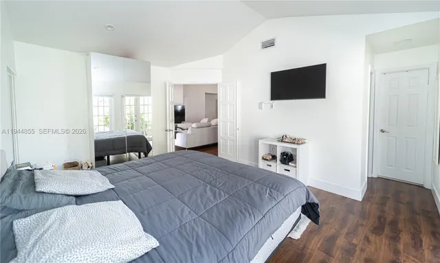 a bathroom with a toilet sink and a shower