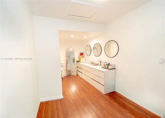 a view of a chairs and table in a patio