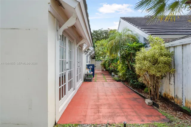 an aerial view of a house with outdoor space