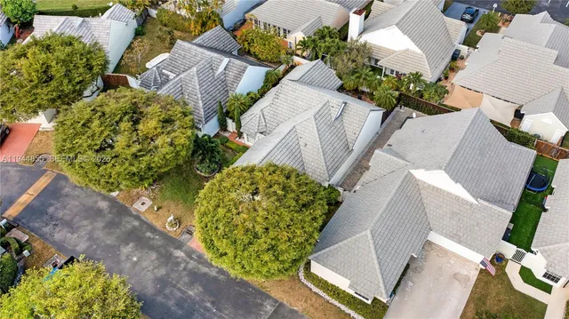 a aerial view of a house with a lake view