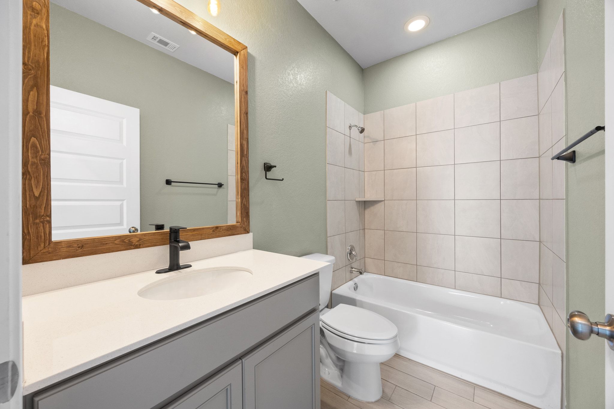 225 Unforgiven Lane Jarrell, TX 76537 - Photo 22 of 30 Bathroom featuring shower / washtub combination and vanity