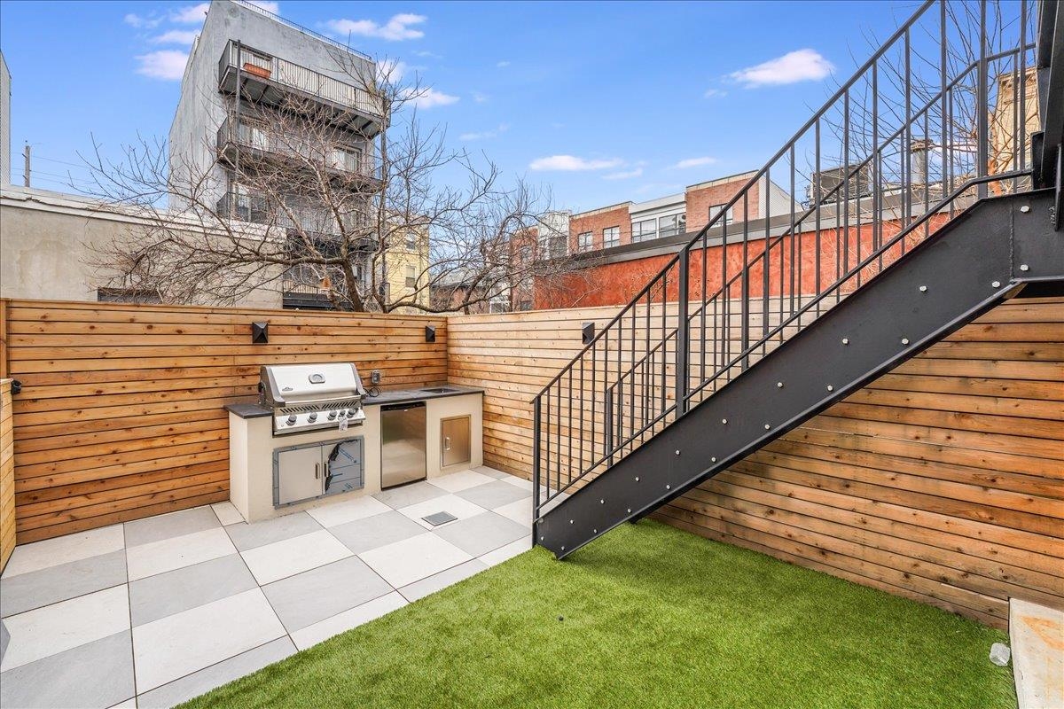 418 Monroe Street, Unit 201 Hoboken, NJ 07030 - Photo 27 of 29 a view of a terrace with sky view