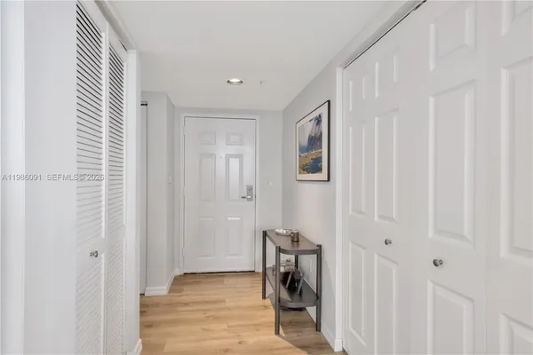 a view of a livingroom with wooden floor