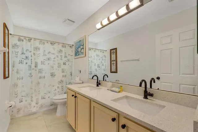 a view of a house with a swimming pool