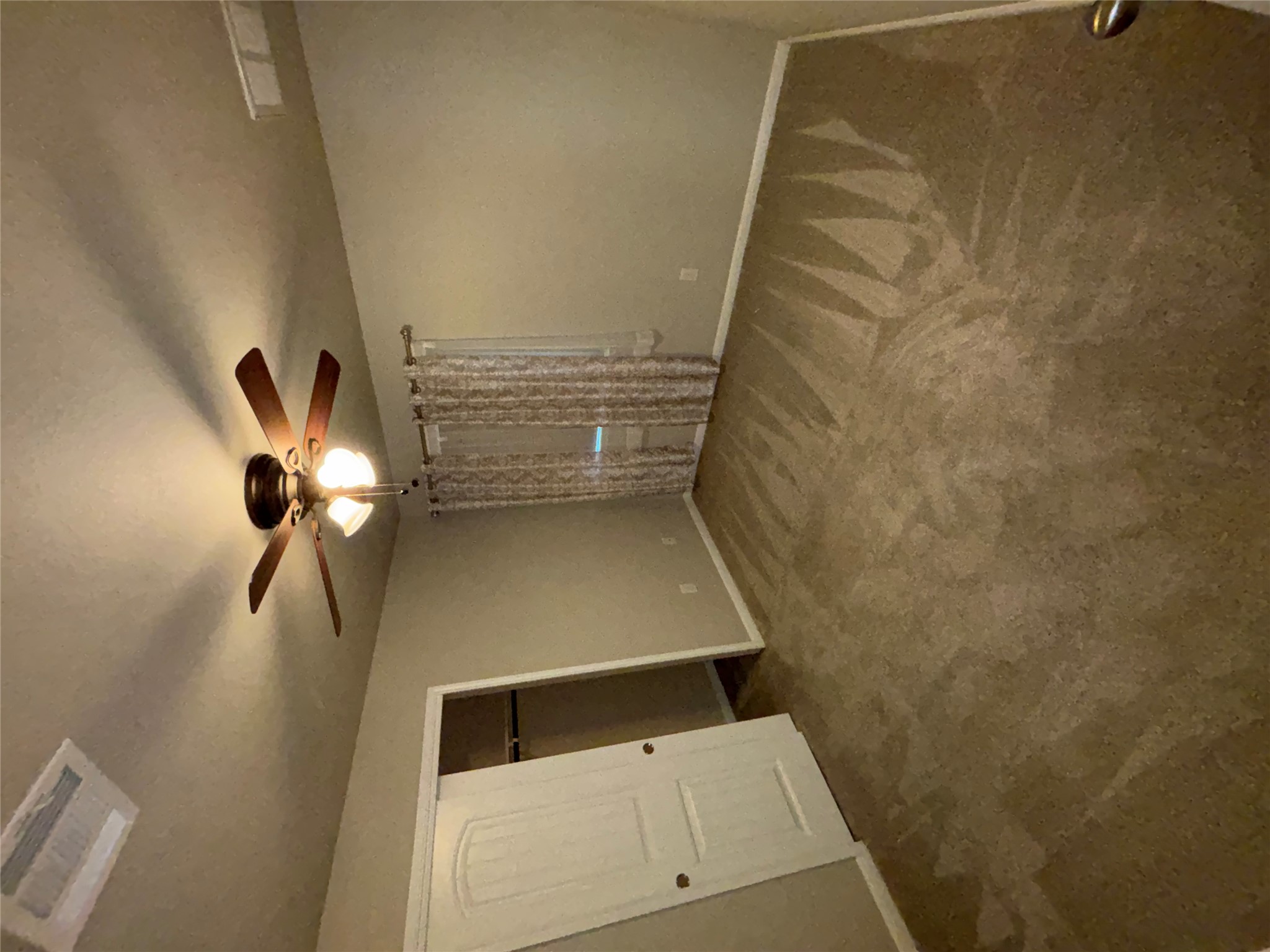 634 River Bluff Circle Georgetown, TX 78626 - Photo 20 of 37 Unfurnished bedroom featuring a closet, dark carpet, and ceiling fan