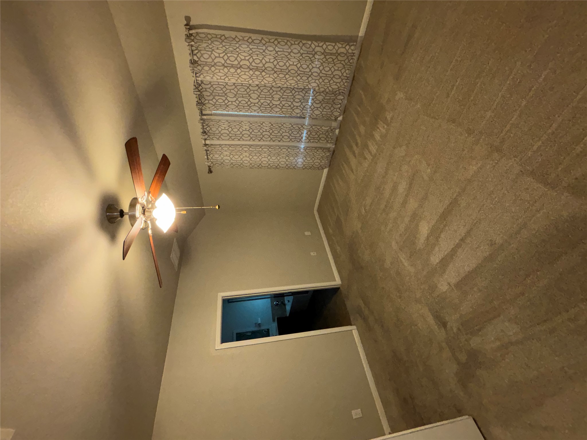 634 River Bluff Circle Georgetown, TX 78626 - Photo 23 of 37 Unfurnished room featuring lofted ceiling, dark carpet, and a ceiling fan