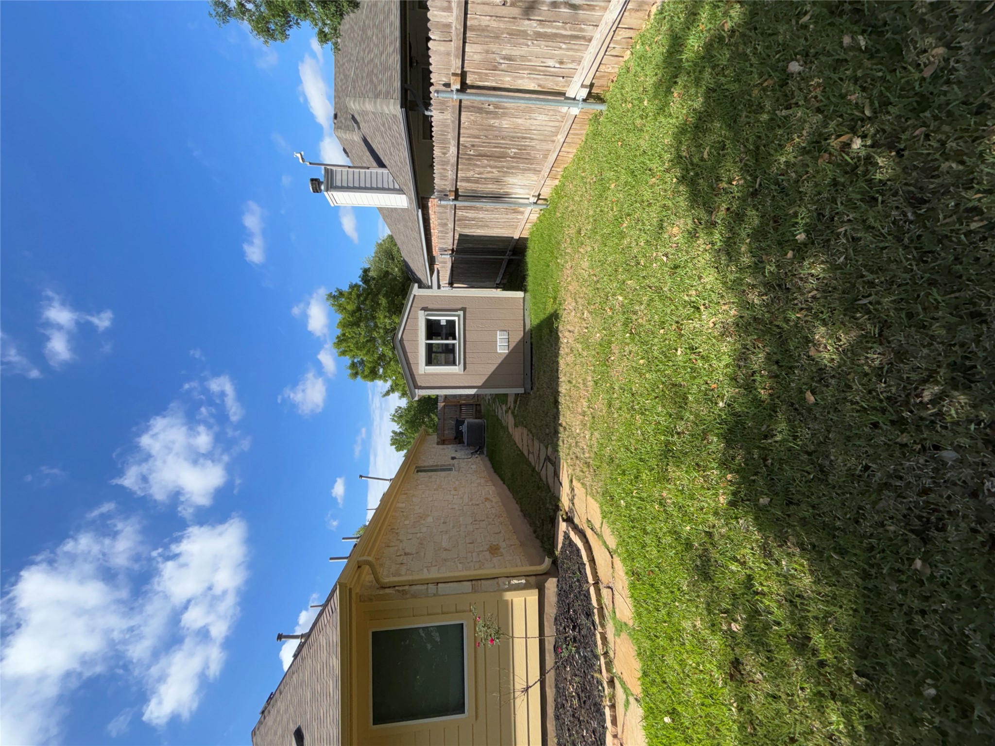 634 River Bluff Circle Georgetown, TX 78626 - Photo 35 of 37 Fenced backyard with a storage unit