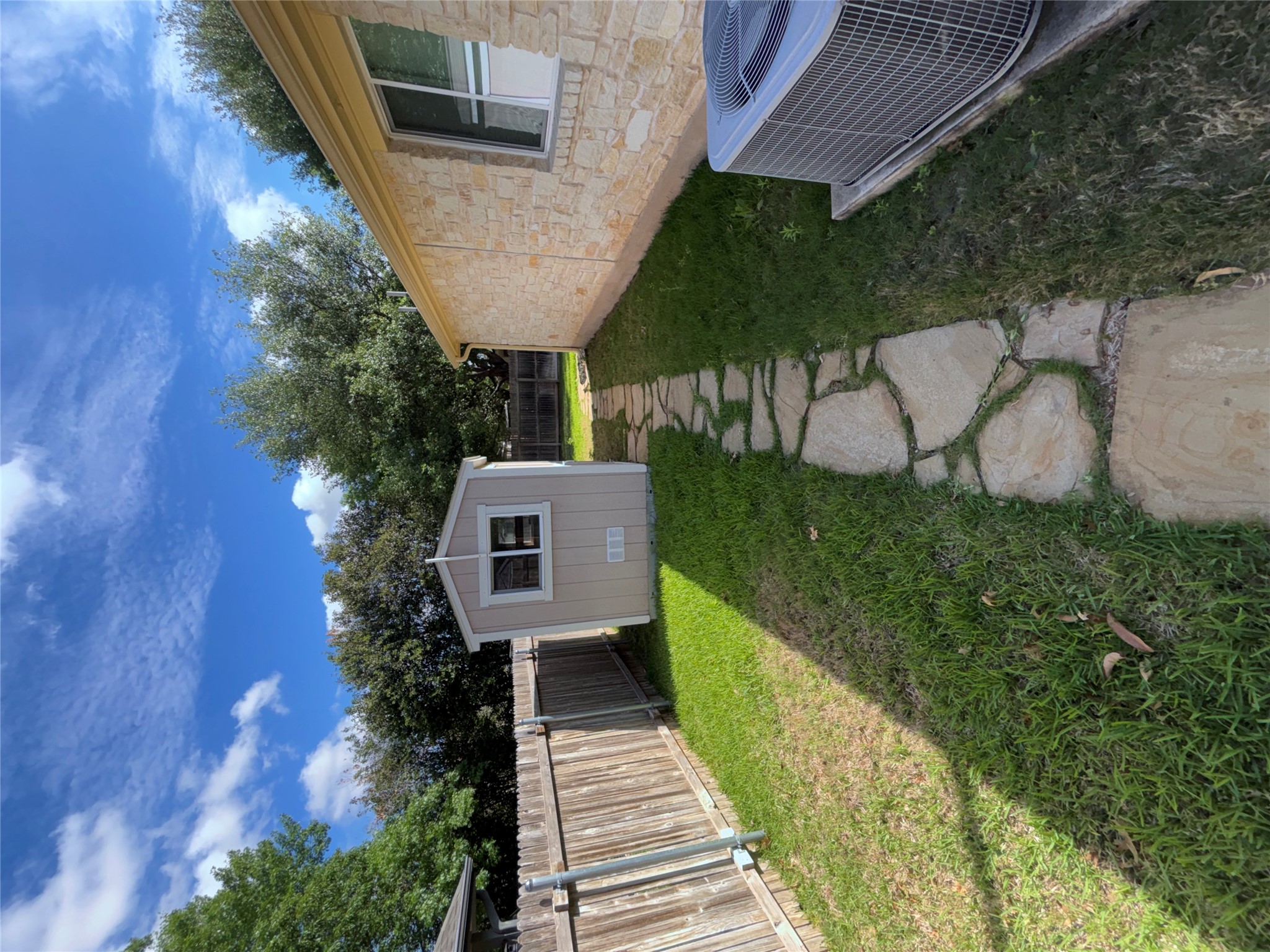 634 River Bluff Circle Georgetown, TX 78626 - Photo 37 of 37 Fenced backyard featuring a storage unit