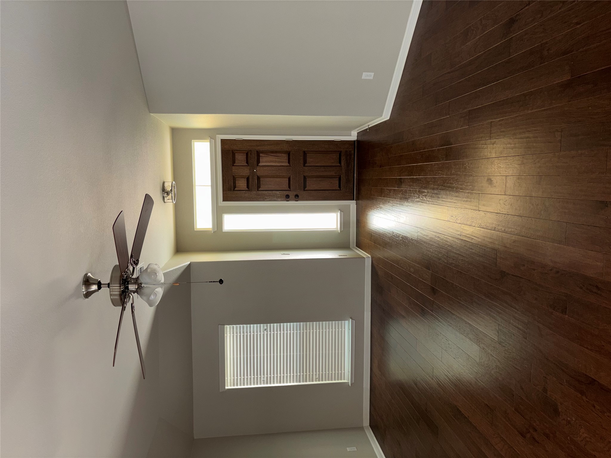 634 River Bluff Circle Georgetown, TX 78626 - Photo 7 of 37 Foyer with a ceiling fan and dark wood-style floors