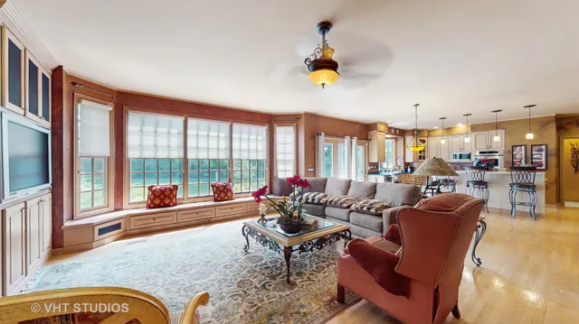 a kitchen with stainless steel appliances a stove a sink and a refrigerator