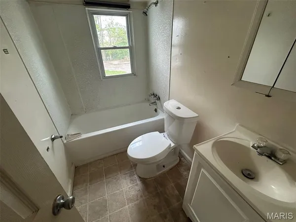 $59,000 | 7303 Harney Avenue, Jennings, MO 63136