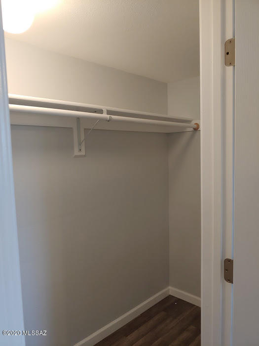 1454 West Roger Road Tucson, AZ 85705 - Photo 8 of 20 a view of an empty walk in closet